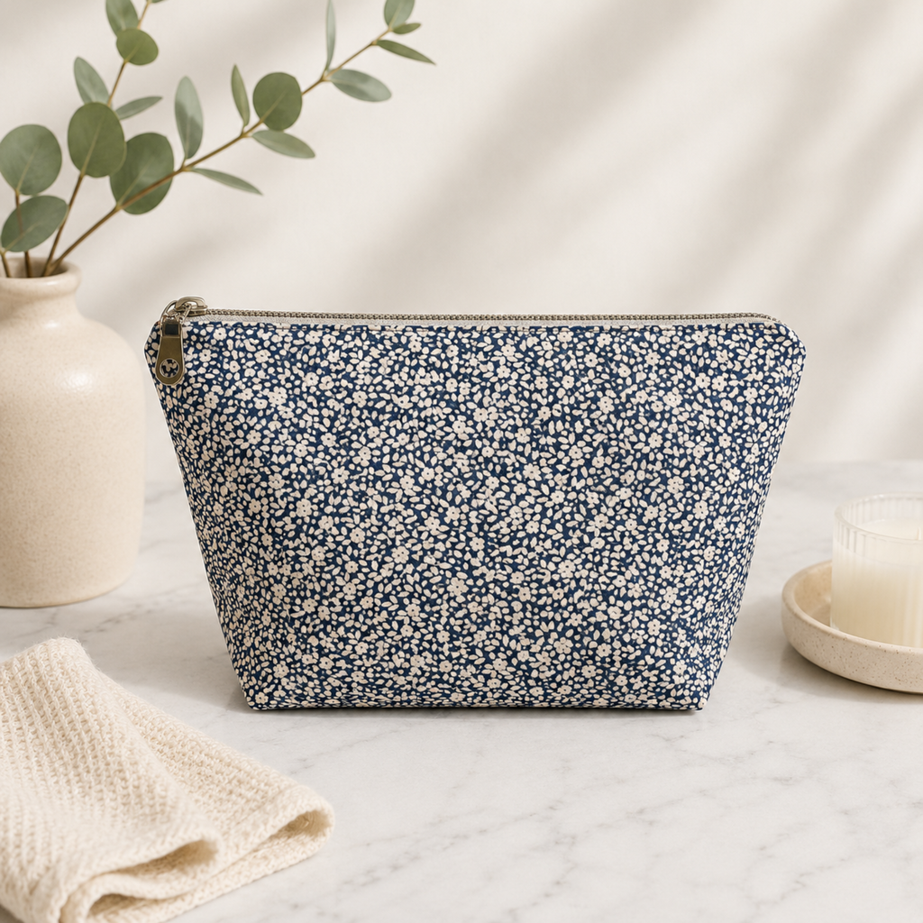 Handmade quilted toiletry bag with small floral print