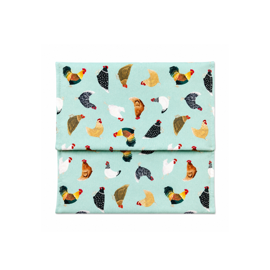 Handmade microwave potato bag with chicken print in kitchen