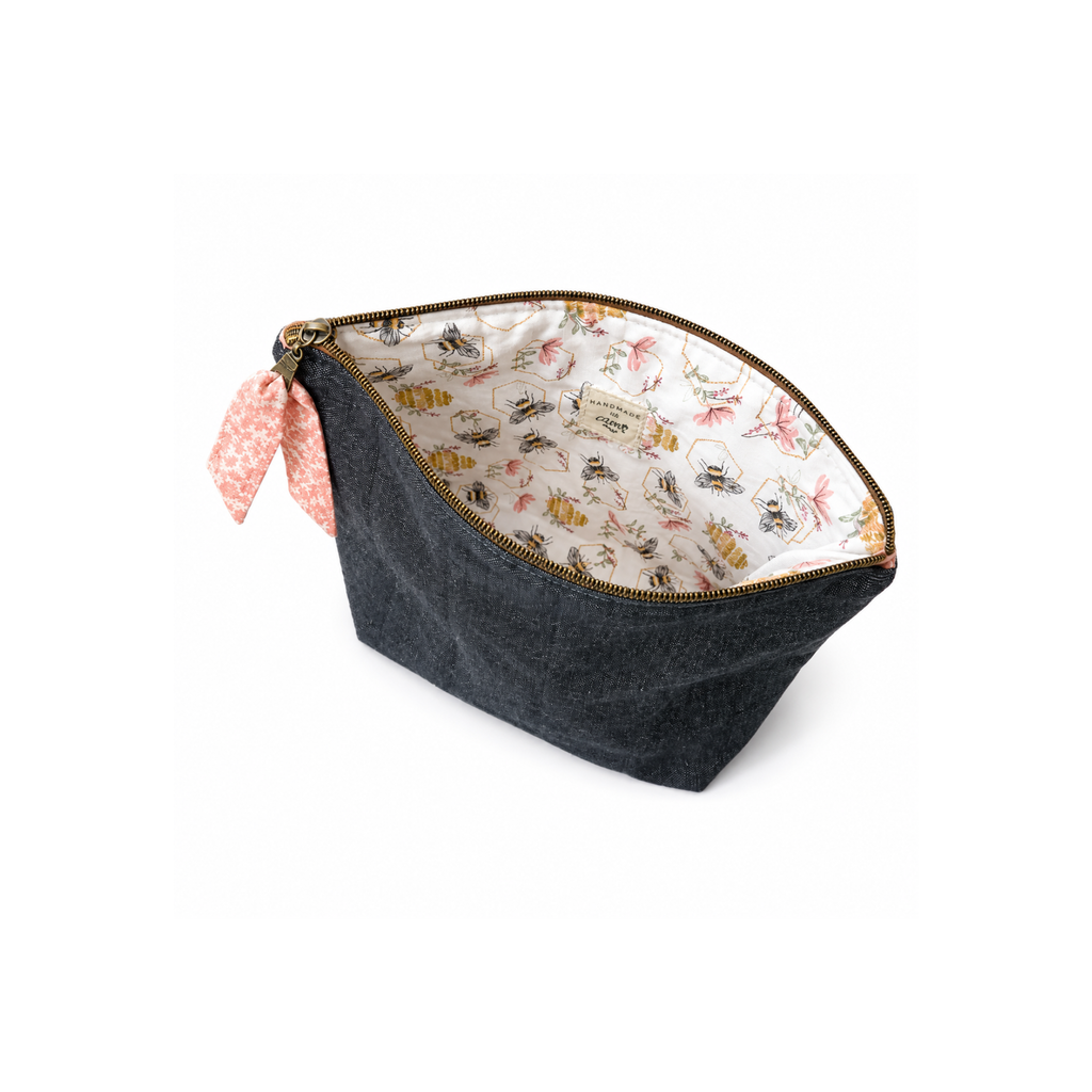 Handmade quilted toiletry bag with bee print