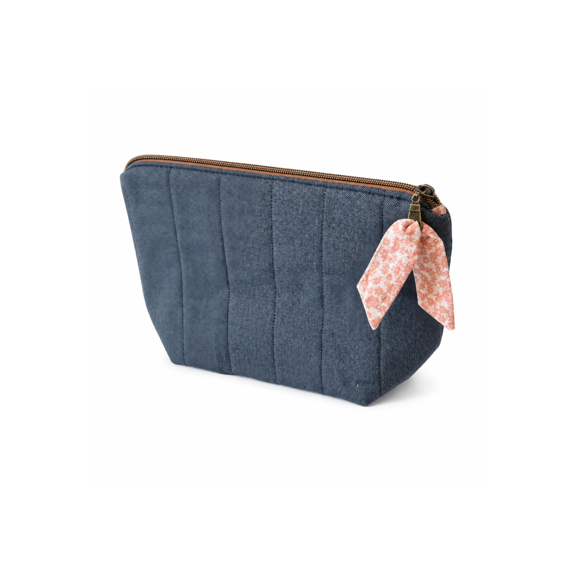Zippered fabric makeup and toiletry bag with bee lining design