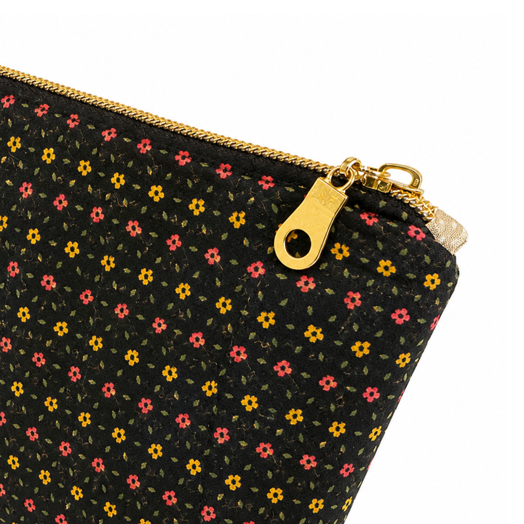 Handmade quilted floral laptop sleeve with zipper closure