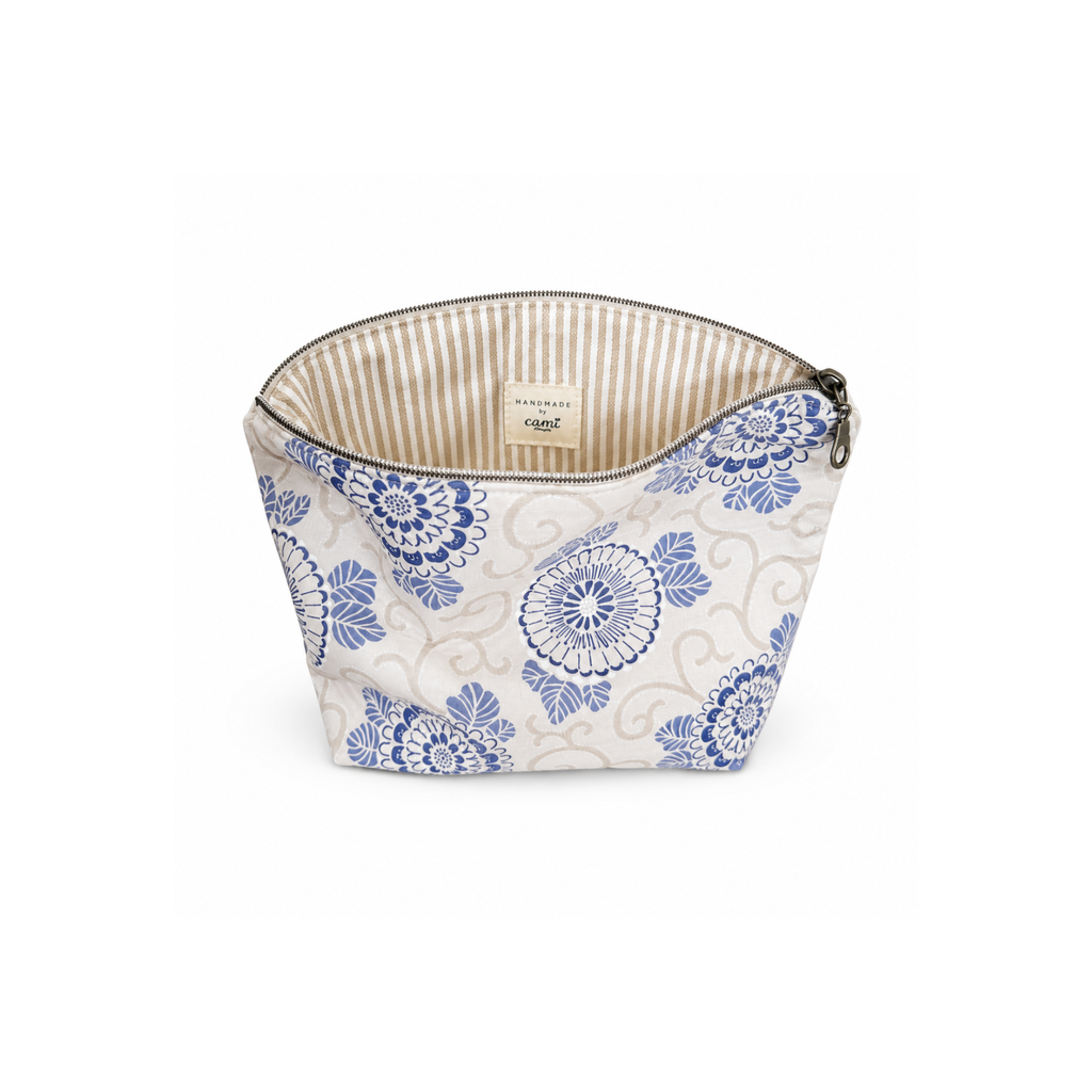 Blue floral zippered makeup bag and organizer with beige strip lining
