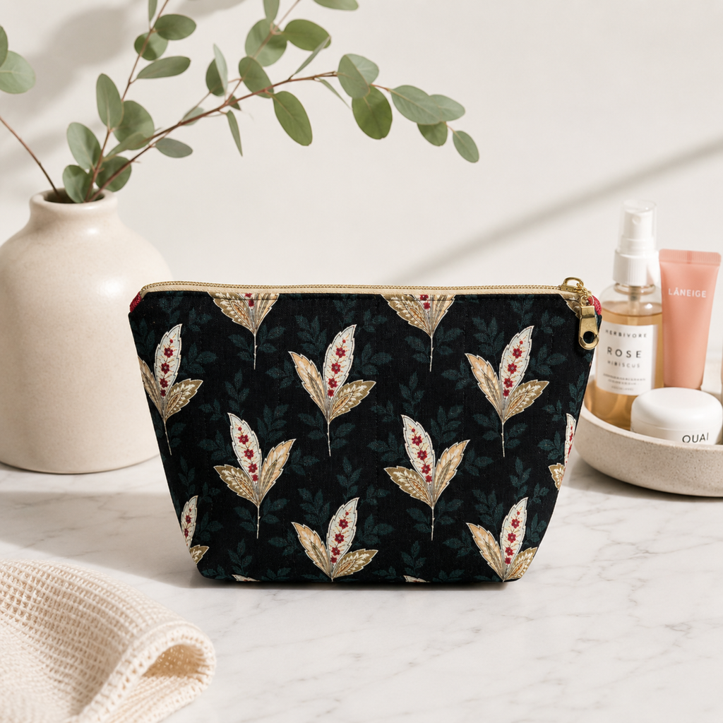 Handmade quilted toiletry bag with floral print