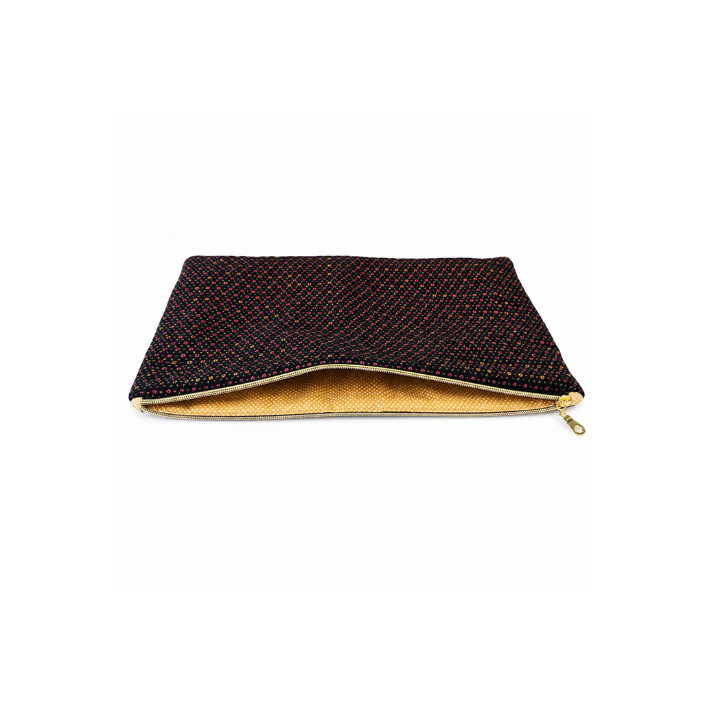 Twilight Bloom laptop sleeve shown with MacBook