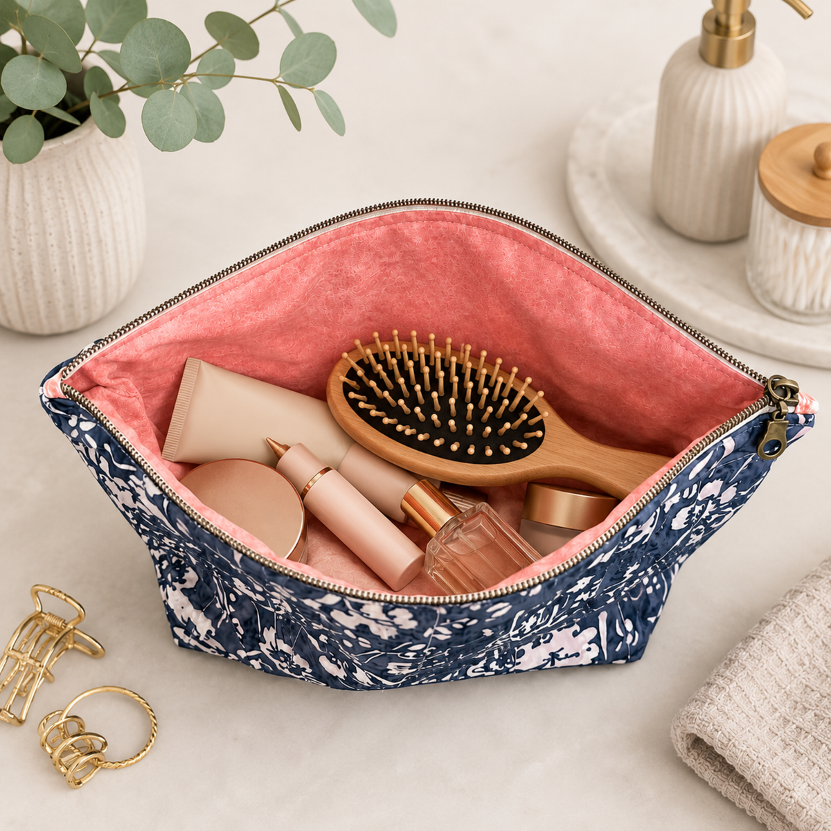 Handmade quilted toiletry bag with botanical print