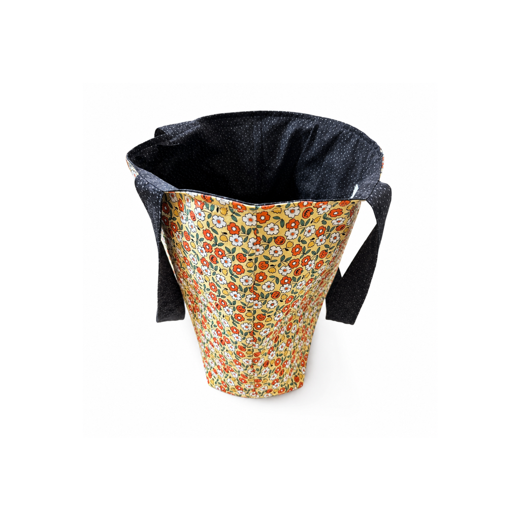 Reusable fabric trick or treat bag with floral pumpkins