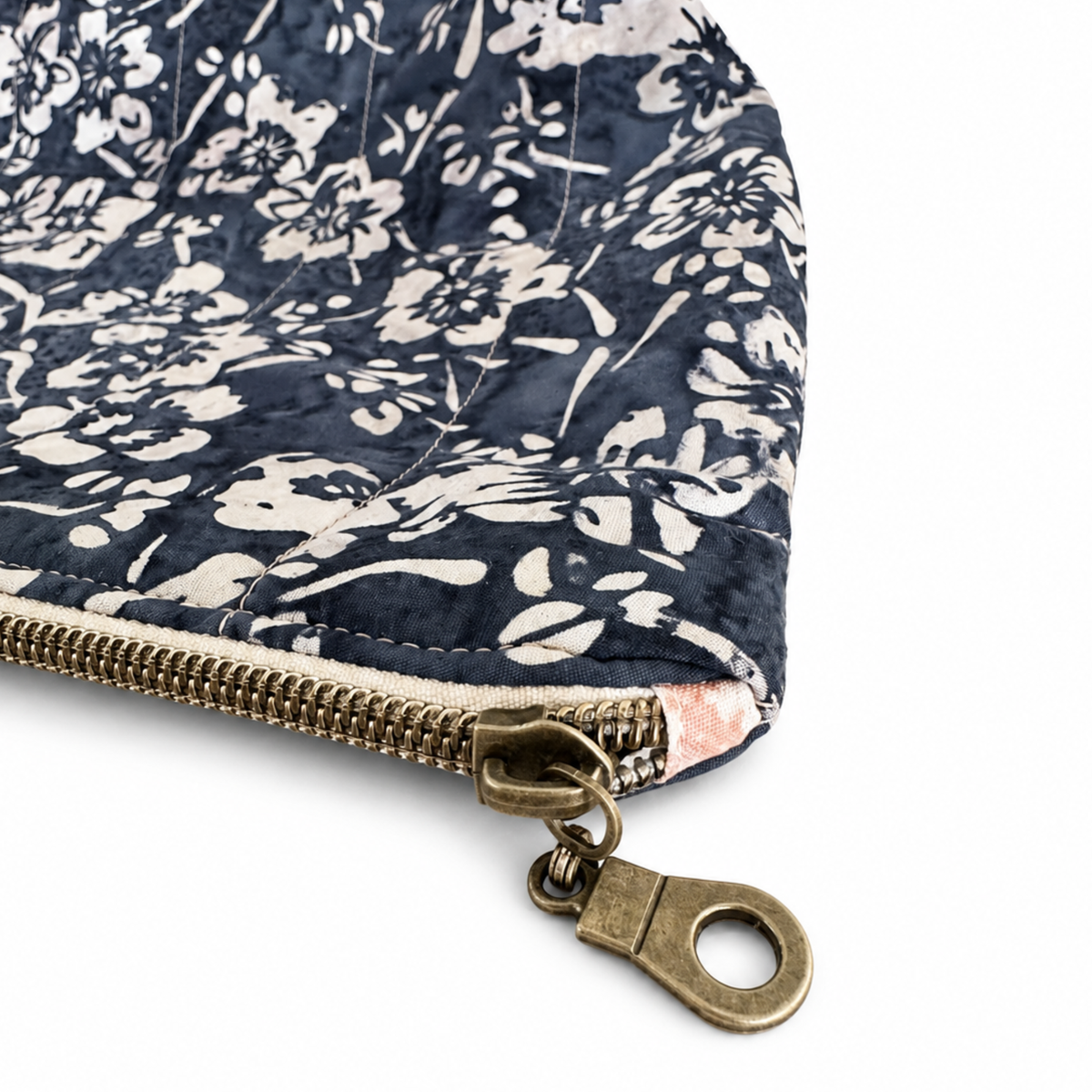 Zippered fabric makeup and toiletry bag with dark floral print
