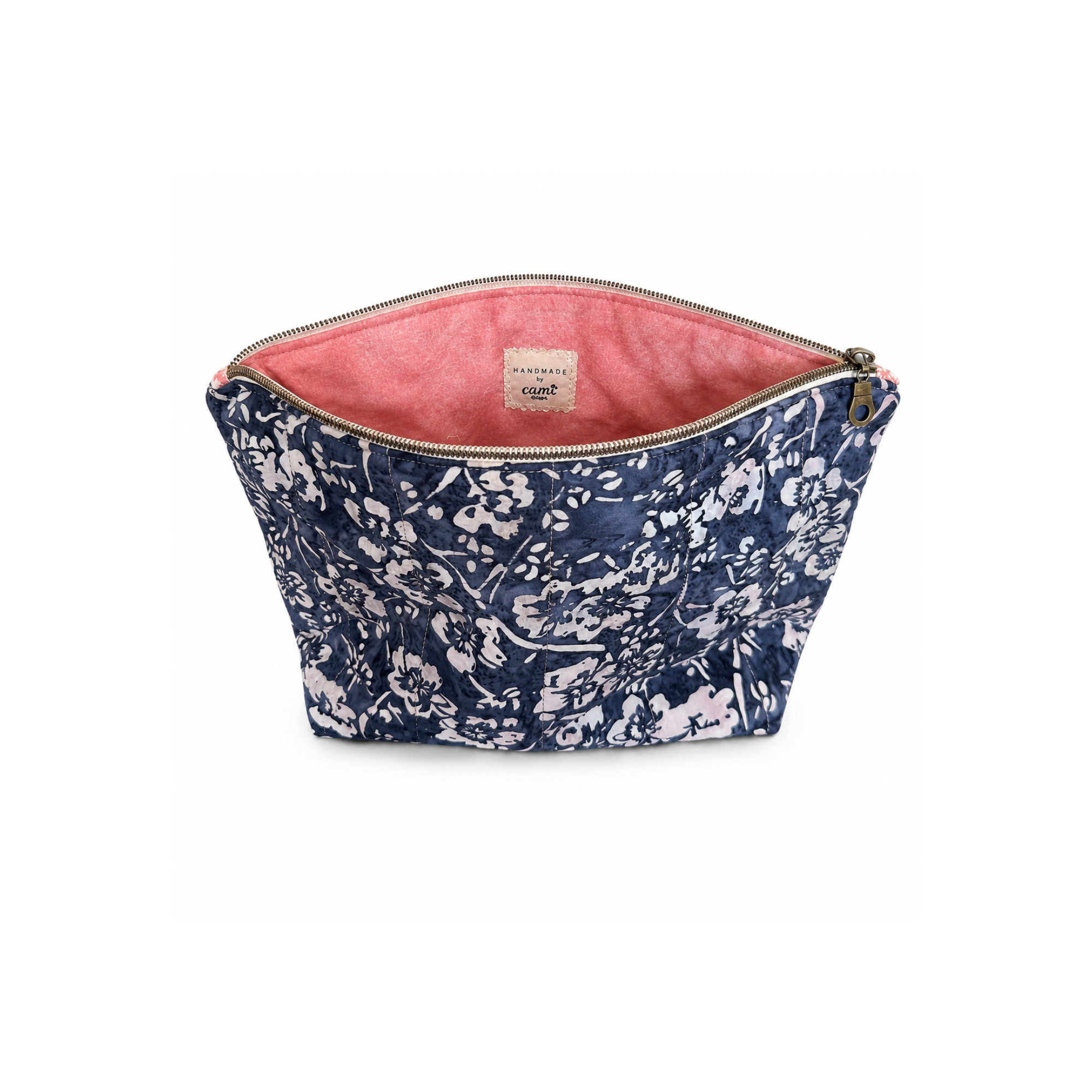 Handmade quilted toiletry bag with botanical print, pink lining