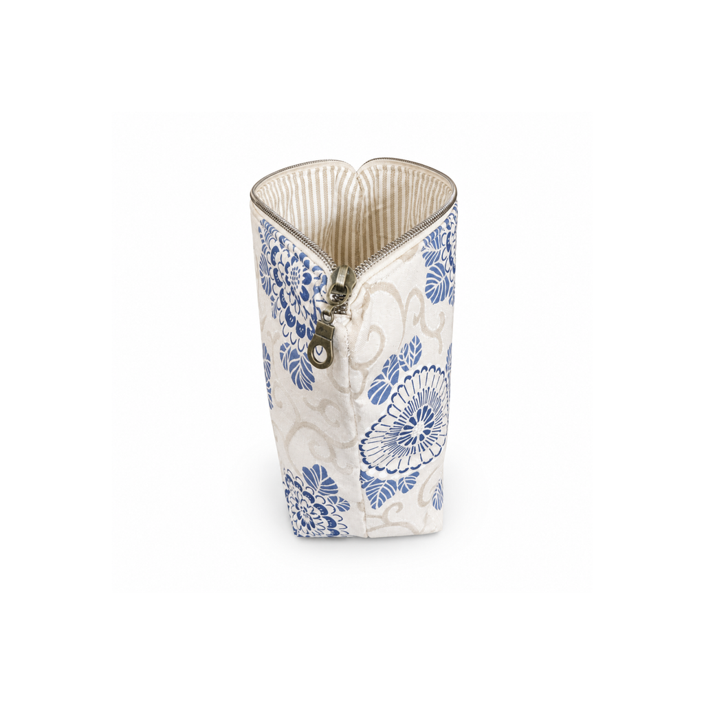 Blue floral cosmetic organizer and travel makeup bag with stripes