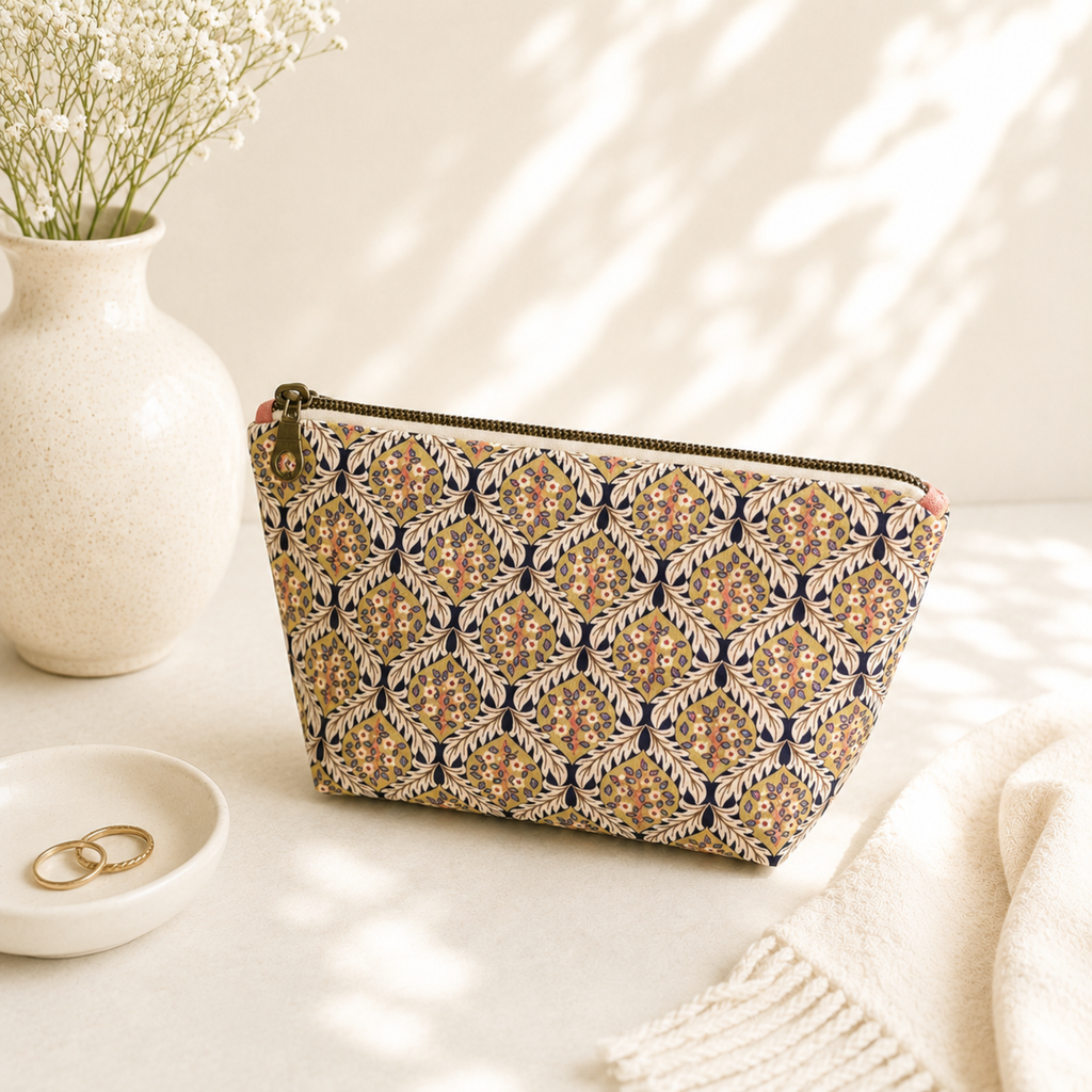 Handmade quilted toiletry bag with floral print
