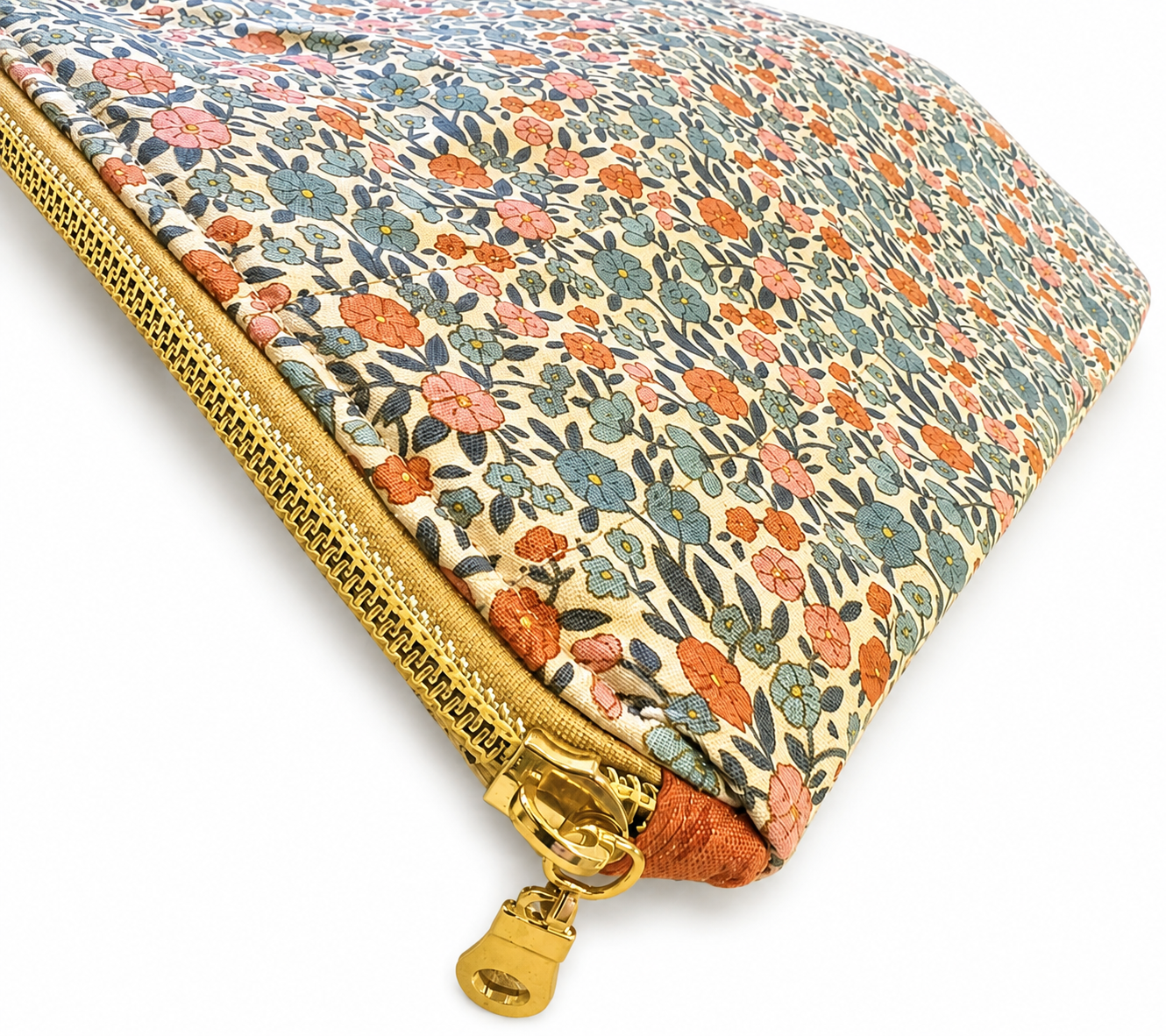 Handmade quilted floral laptop sleeve with zipper closure