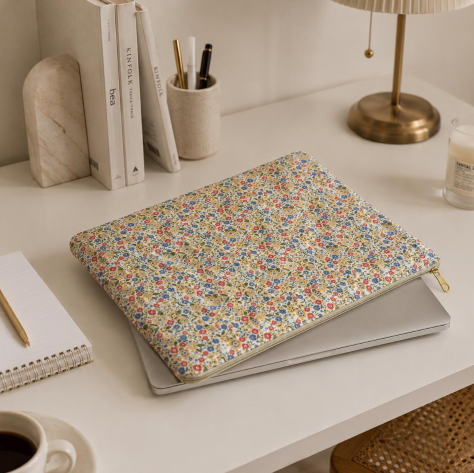 Padded MacBook sleeve with golden wildflower print